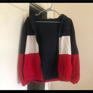 Red, white, and blue jacket.